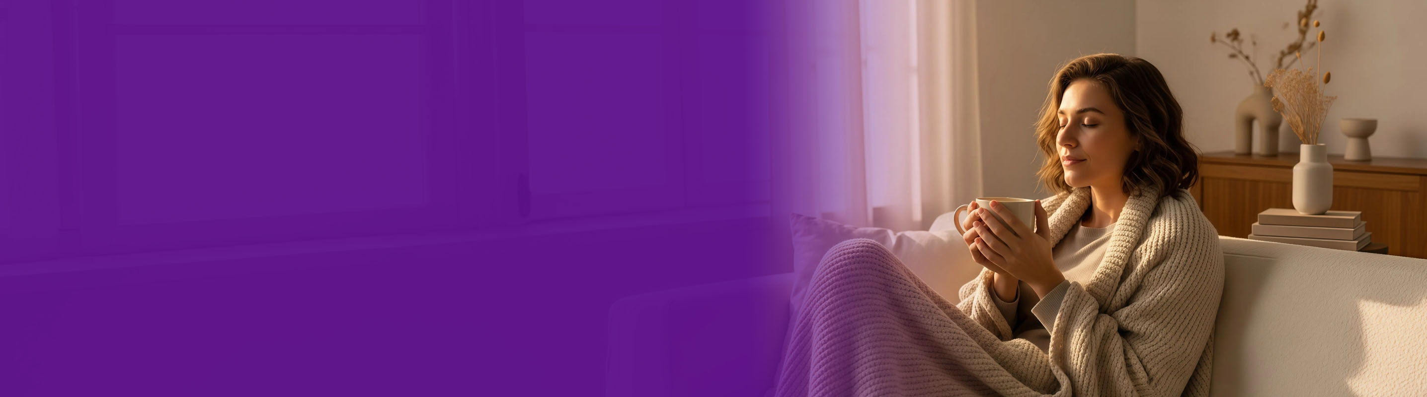 women standing on a hill top overlooking a valley