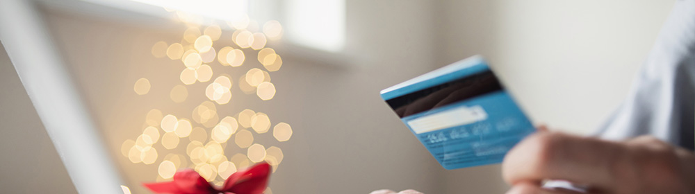 person using a credit card