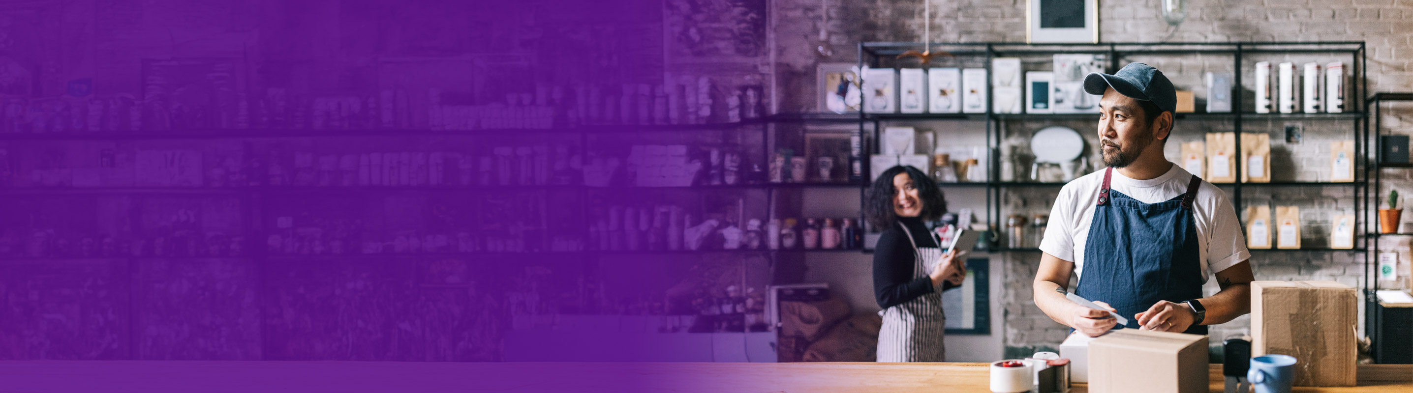 business owner preparing a box for shipping